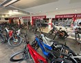 Fahrradwerkstatt: Red Plates - E-Bikes, Service und Reparaturen.